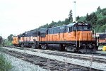 Milwaukee Road U30B #5607 & U28B #5503 with caboose. U23B #5003 in background.